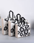 50pcs, 3 Sizes Classic Black Flower Non-woven Gift Bag