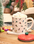 Ceramic Skiing Mug with Lid and Skis Coaster by GUTE - Cute